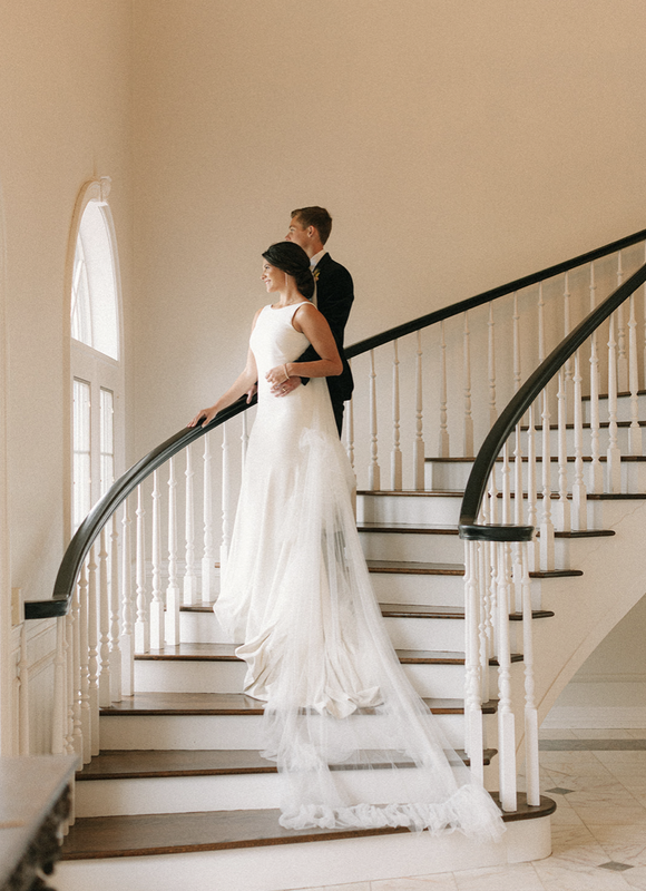 Beautiful wedding staircase with bride and groom. Dreamy wedding pictures.